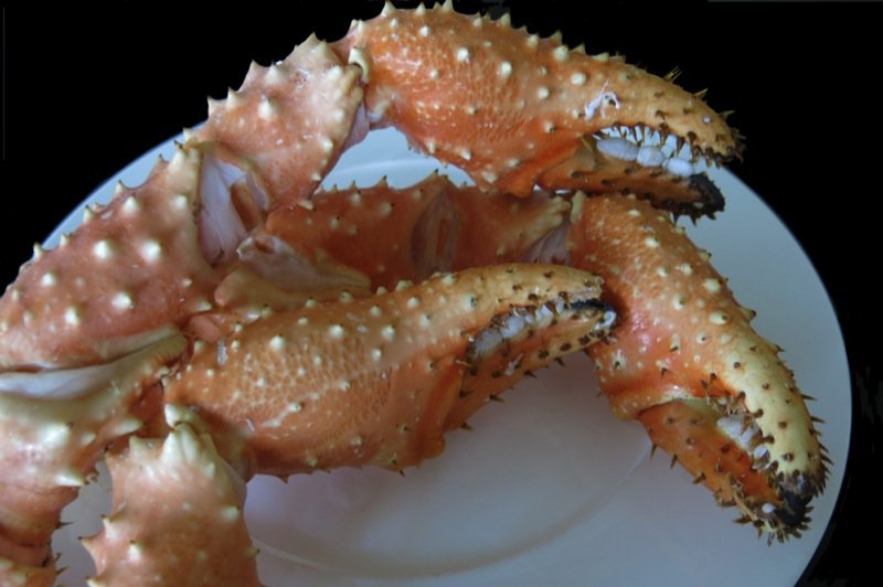 8 Three Alaska King Crab Claws on Plate