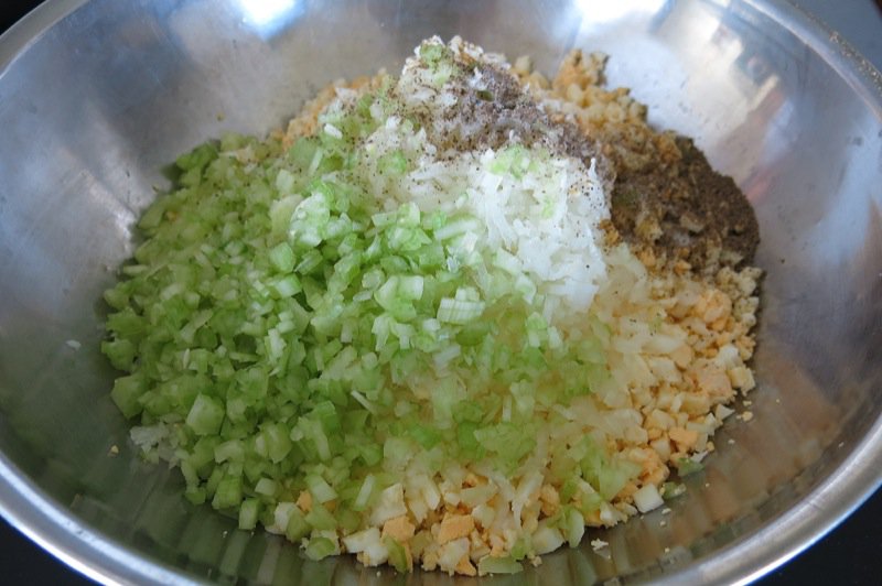 10 egg onion celery salt pepper in bowl