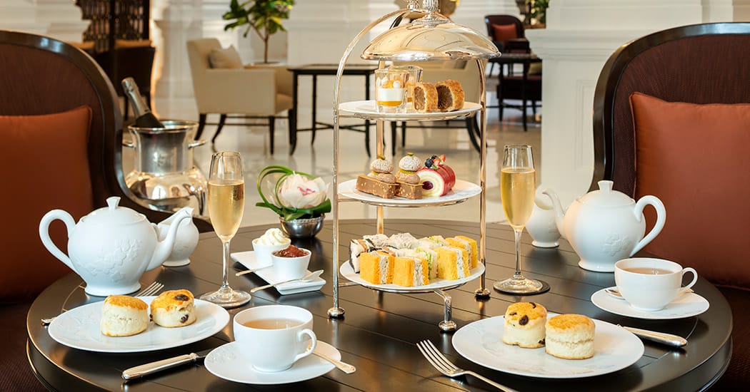 table set up with afternoon tea in Singapore